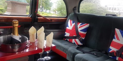 Hochzeitsauto-Vermietung - London Taxi in schneeweiss