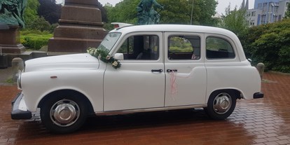 Hochzeitsauto-Vermietung - Seevetal - London Taxi in schneeweiss