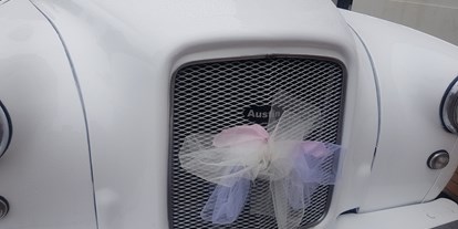 Hochzeitsauto-Vermietung - London Taxi in schneeweiss