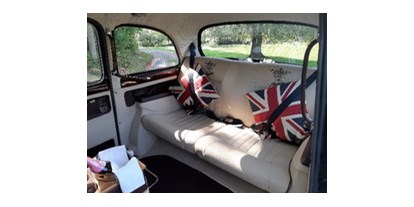 Hochzeitsauto-Vermietung - Farbe: Schwarz - Binnenland - London Taxi in schwarz mit weisser Ausstattung - London Taxi Oldtimer