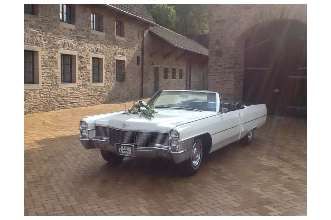 Hochzeitsauto: Cadillac de Ville Hochzeitsauto Cabriolet - weiß Ruhrgebiet - Cadillac Weddingcar - Hochzeitsauto & Fotografie
