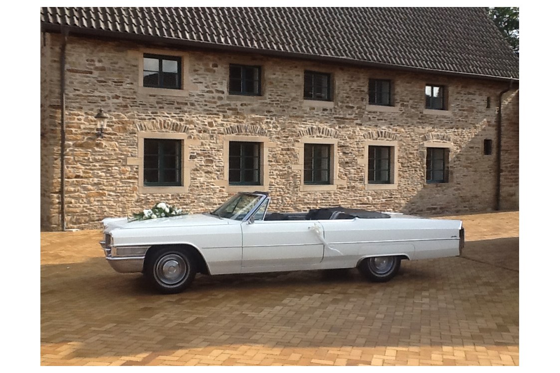 Hochzeitsauto: Cadillac de Ville Hochzeitsauto Cabriolet - weiß Ruhrgebiet - Brautauto - Cadillac Weddingcar - Hochzeitsauto & Fotografie