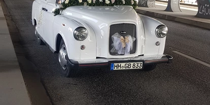 Hochzeitsauto-Vermietung - Marke: Austin - PLZ 20459 (Deutschland) - London Taxi in schneeweiss