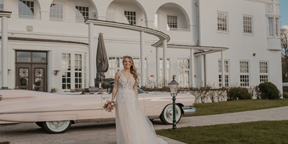 Hochzeitsauto-Vermietung - Einzugsgebiet: national - Goldelund - Traumhaftes Pink Cadillac 1959 Cabrio 