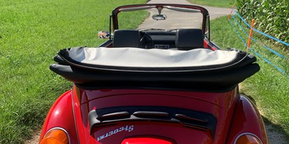 Hochzeitsauto-Vermietung - Art des Fahrzeugs: Oldtimer - Liestal - Auch mit Chauffeur buchbar - VW Käfer Cabriolet rot
