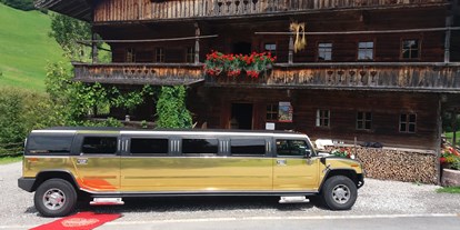Hochzeitsauto-Vermietung - Farbe: Gold - HUMMER Limousine