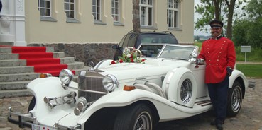 Hochzeitsauto-Vermietung - Marke: Excalibur Automobile - Lassen Sie sich mit einem " Excalibur " in Weiß zur Kirche chauffieren oder eine Geburtstagsfahrt unternehmen. - Oldtimer  " Excalibur " Cabrio