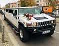 Hochzeitsauto: weiße Hummer H2 Stretchlimousine
