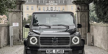 Hochzeitsauto-Vermietung - Farbe: Grau - Fahrzeug von vorne. - Mercedes G-Klasse G500