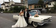 Hochzeitsauto-Vermietung - Farbe: Weiß - Hochzeit in Glarus - Cadillac Deville Cabriolet - Oldtimer-Traumfahrt